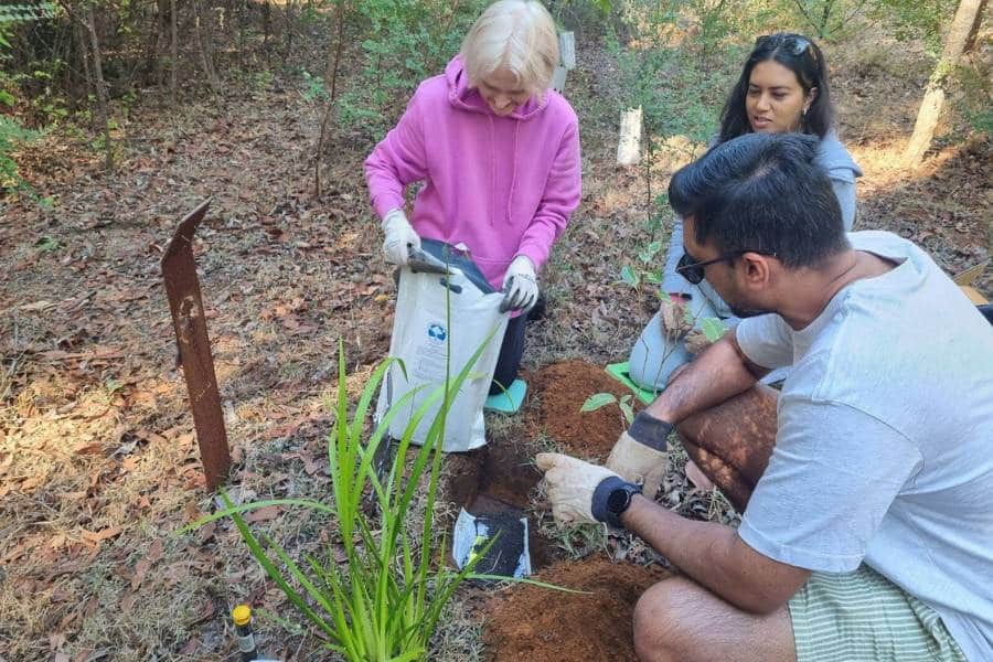 A family planting a memorial tree in Perth at Wellington Dam Living Legacy Forest